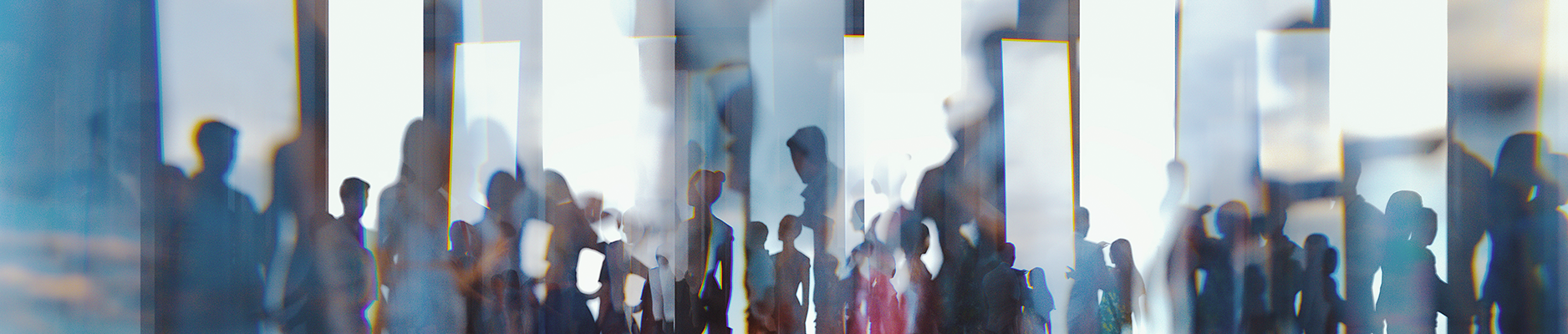 Abstract people silhouettes against glass
